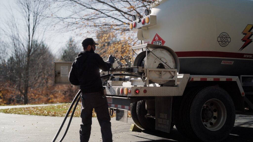 Crystal Flash propane truck driver delivering fuel