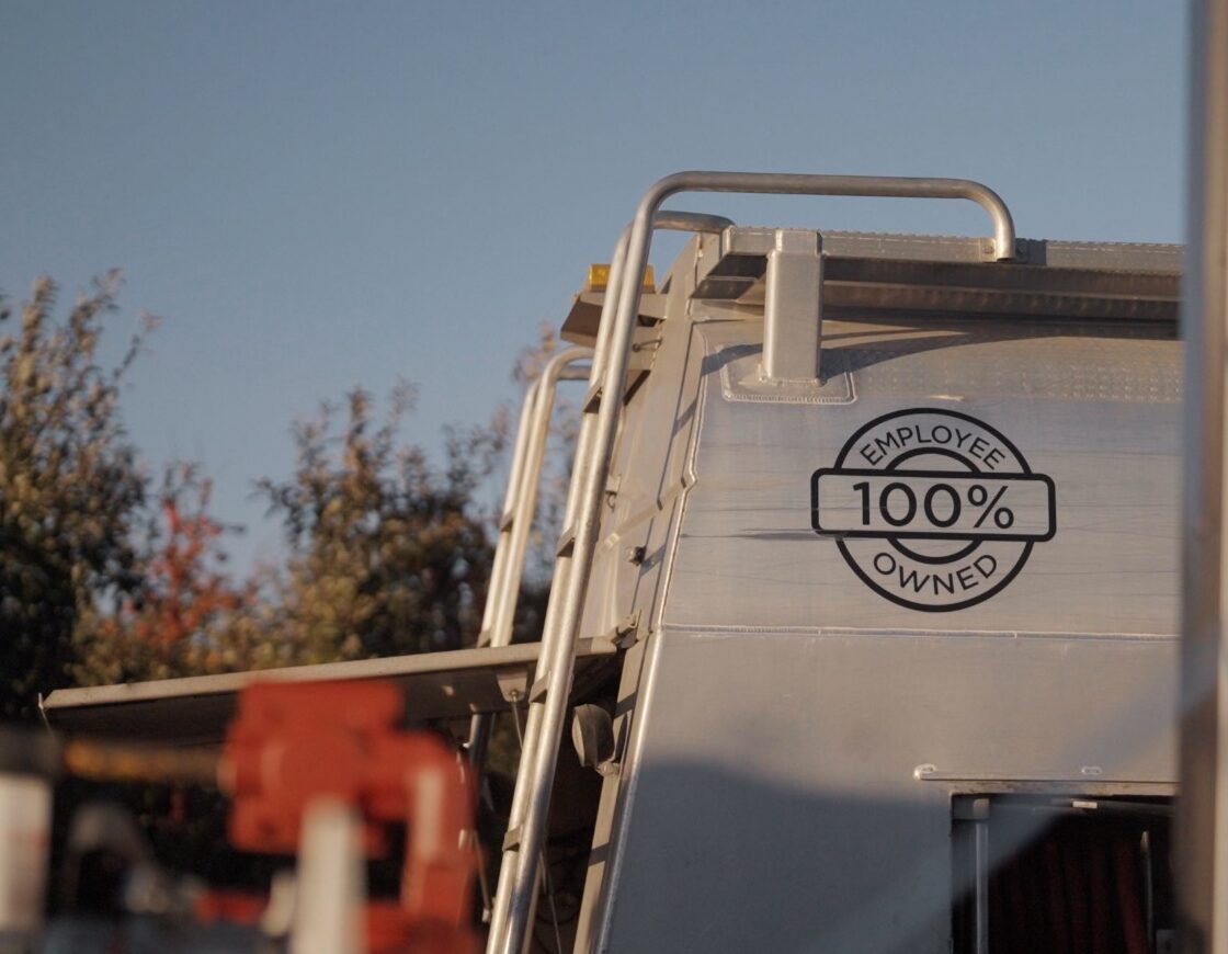 Back of a Crystal Flash fuel truck showing 100% Employee-Owned graphic